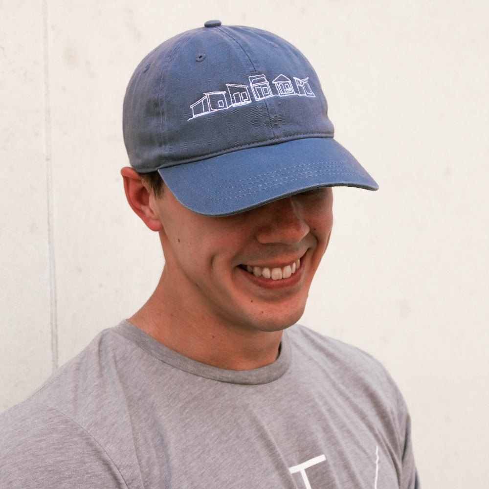 community first village tiny home dad cap blue